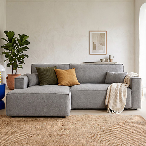 Canapé d'angle à gauche convertible 3 places en tissu bouclé gris clair - Asti