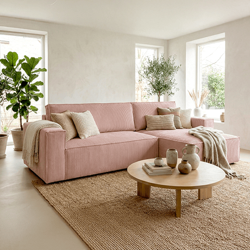 Canapé d'angle convertible réversible 4 places avec coffre de rangement en velours côtelé rose pâle - Livia