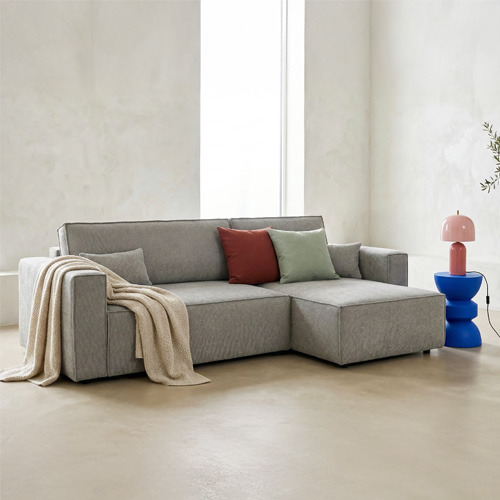 Canapé d'angle convertible réversible 4 places avec coffre de rangement en tissu chenille gris - Livia