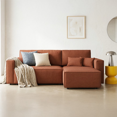 Canapé d'angle convertible réversible 4 places avec coffre de rangement en tissu chenille rouille foncé - Livia