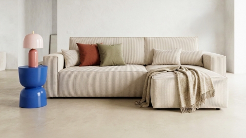 Canapé d'angle convertible réversible 4 places avec coffre de rangement en velours côtelé beige - Livia